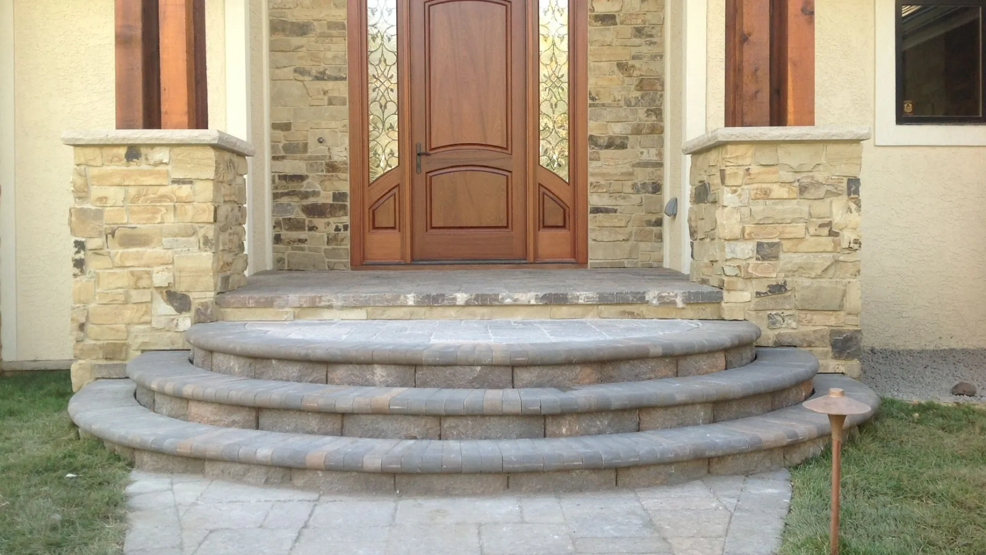 Outdoor steps built for front door in Waukee, IA.
