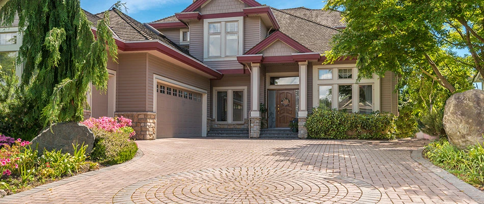 Sunning new decorative driveway on a property in Norwarlk, IA and surrounding areas.