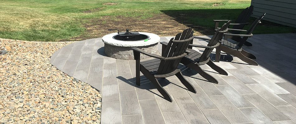 Fire pit installed over a patio in Clive, IA.