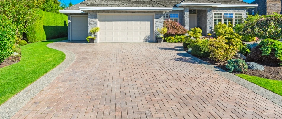 Interlock designed bricks for driveway in Ankeny, IA.