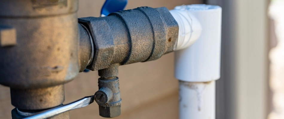 Professional performing an irrigation start up in Grimes, IA.