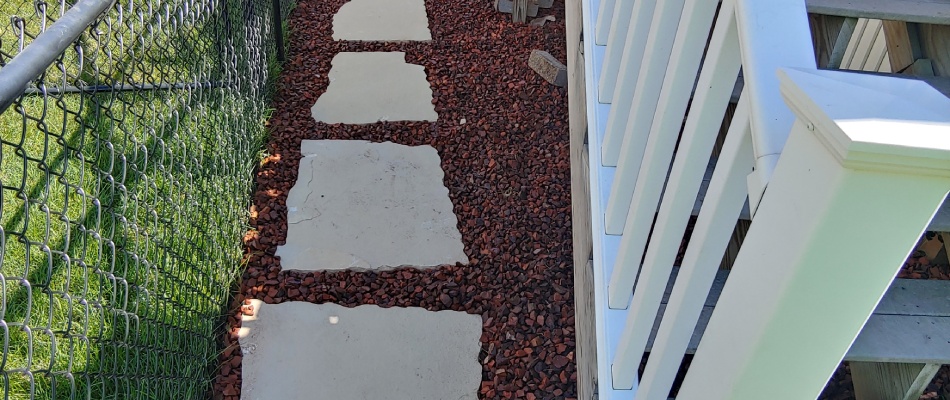 Paver outdoor steps installed beside stairs in Grimes, IA.