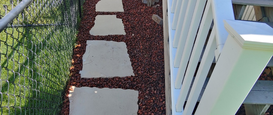 Paver outdoor steps installed beside stairs in Grimes, IA.