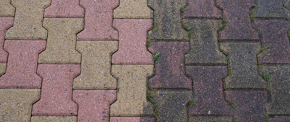 Paver patio cleaned and sealed before and after near Des Moines, IA.