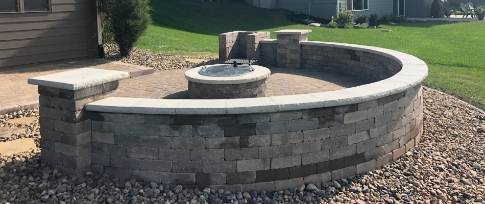 Seating wall installed for firepit area in West Des Moines, IA.
