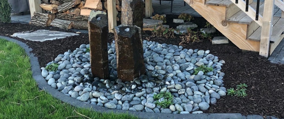Water bubbler feature installed beside stairs in Waukee, IA.